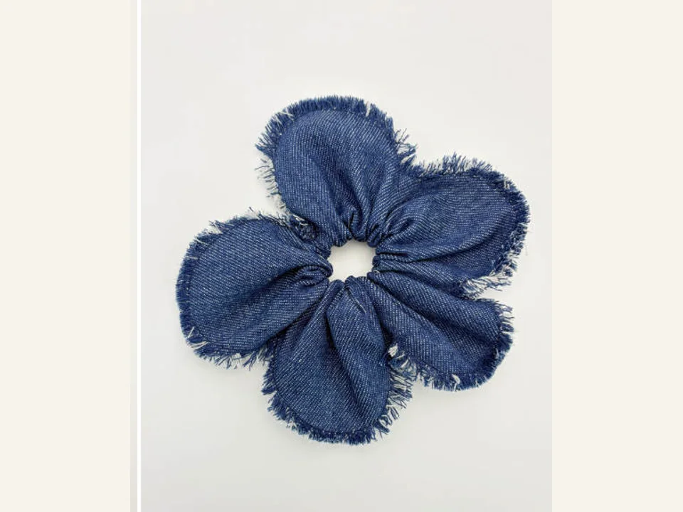 Navy frayed-edge fabric flower development sample