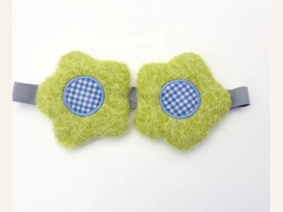 Green textured shaped sleep mask development sample