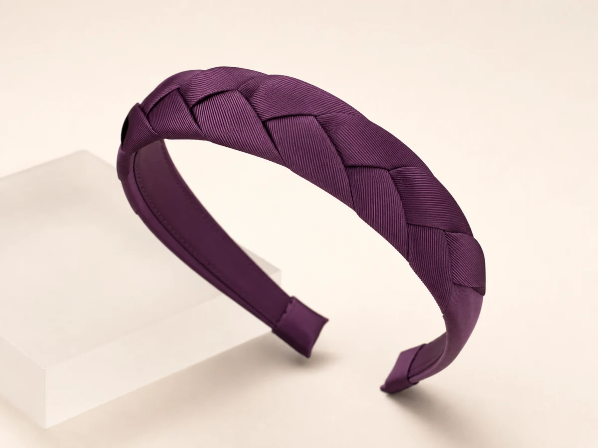 Deep plum headband with a controlled three-strand braided grosgrain overlay